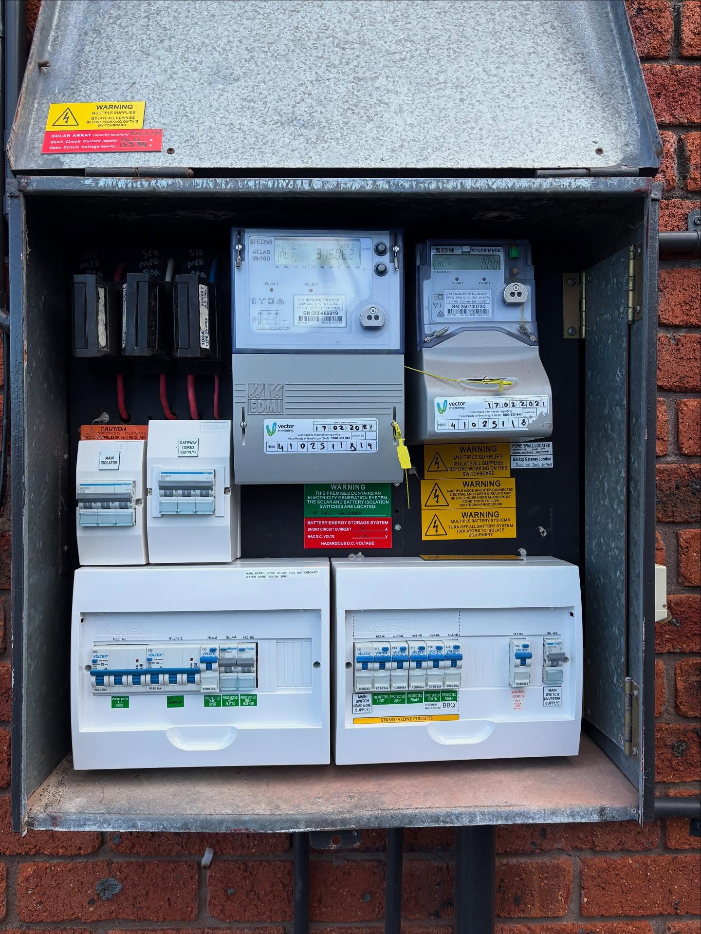 Australian home switchboard integrating rooftop solar inverter and battery storage